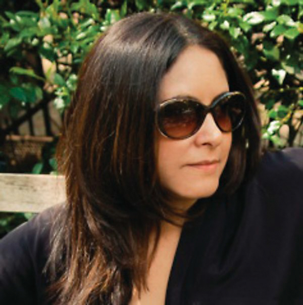 Photo of Yvette Piñeyro in sunglasses. Yvette is the chief creative officer of Wildchild and co-founder of Dreamboat Group New York Creative Agency.